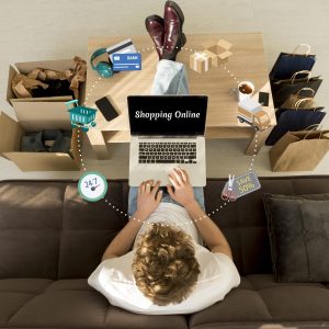 top-view-man-doing-online-shopping-his-laptop top-view-man-doing-online-shopping-his-laptop